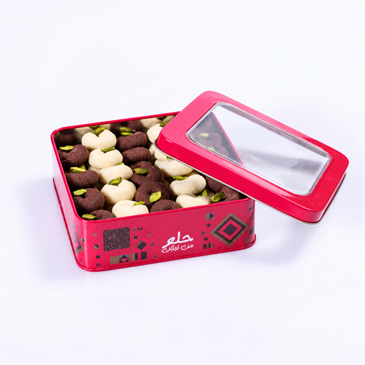 Douaihy Ghoraybeh Chocolate ~ 50pcs. Chocolate and pale pistachio-topped shortbread in a pink windowed tin.