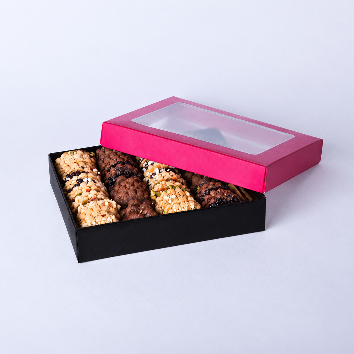 Douaihy Petit Four ~ 30pcs. Assorted chocolate and nut petit four cookies in a black box with pink lid.