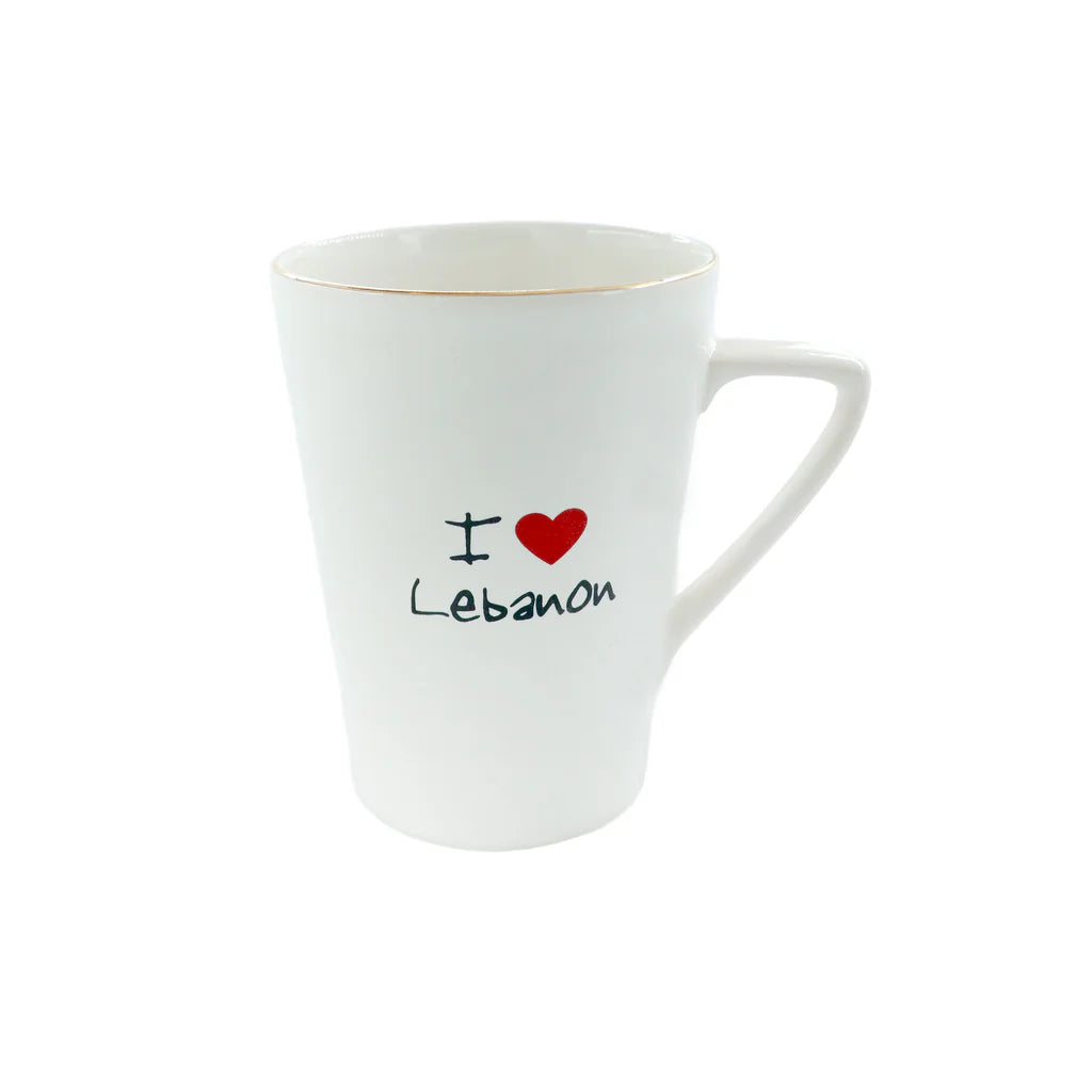 White porcelain mug featuring I Love Lebanon artwork with elegant minimalist design