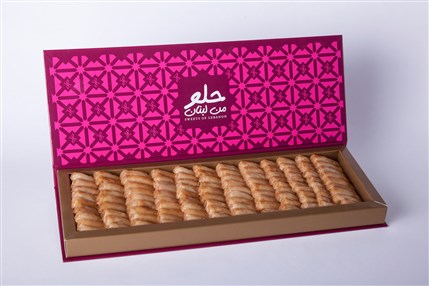 Luxury Lebanese baklava assortment in premium book-style gift box by Douaihy Sweets