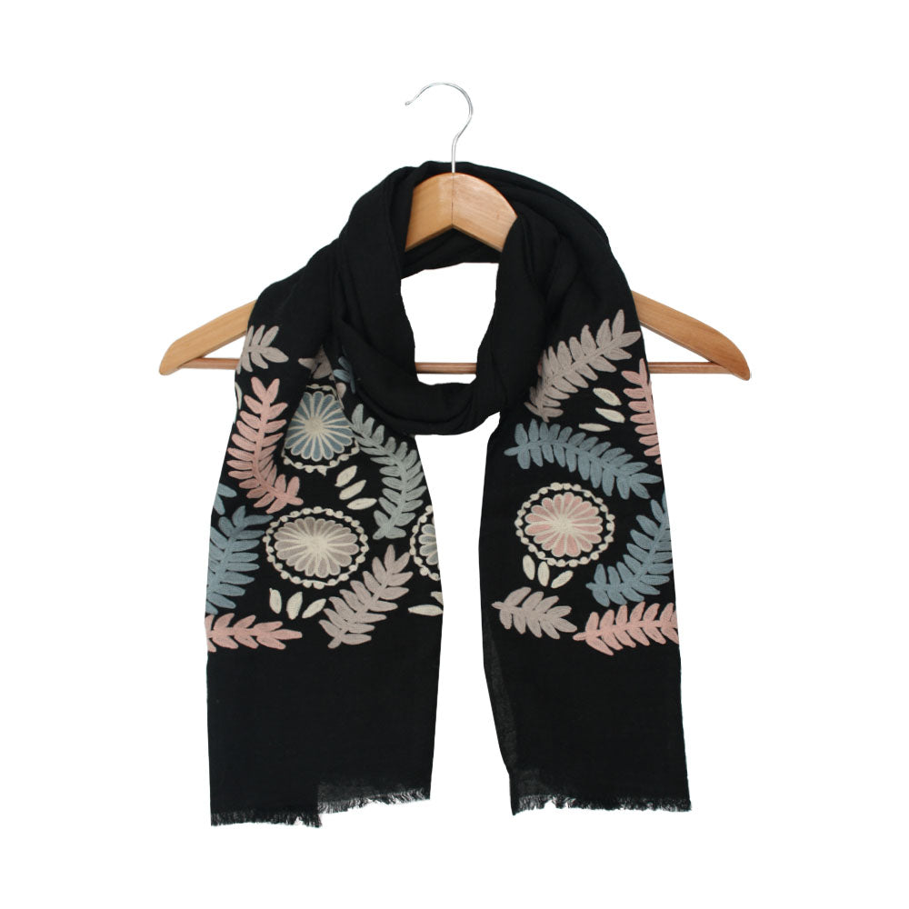 Black wool scarf with leaf pattern by Mouftah El Chark, elegant winter accessory at Idole Lebanon