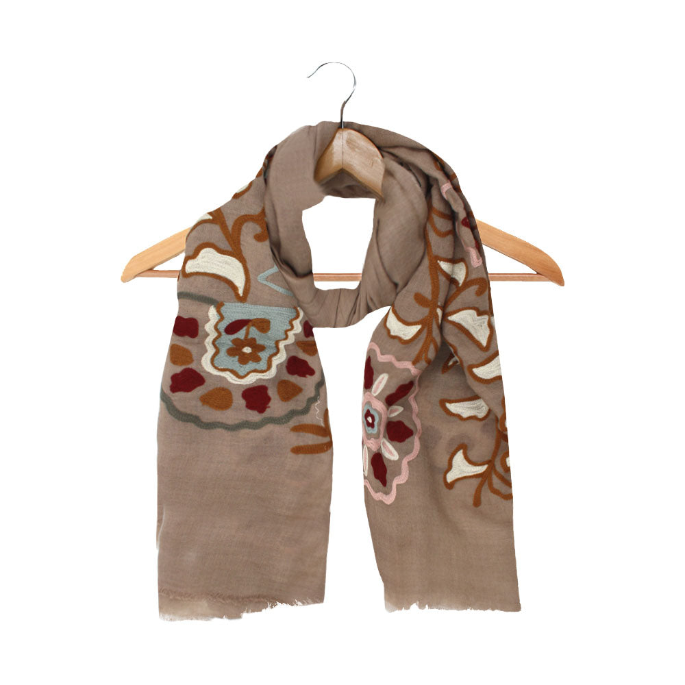Beige wool scarf with floral pattern by Mouftah El Chark, elegant and versatile winter accessory at Idole Lebanon