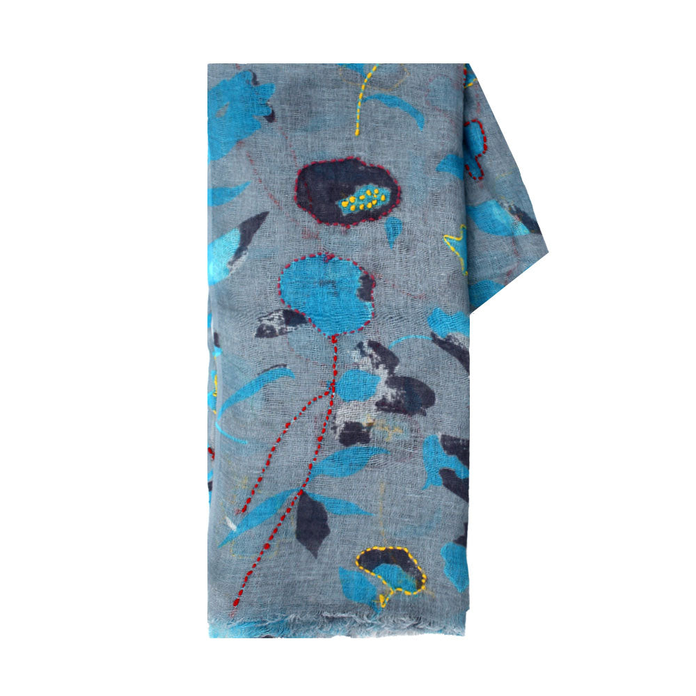 Wool scarf with blue floral pattern by Mouftah El Chark, artistic elegant winter accessory at Idole Lebanon