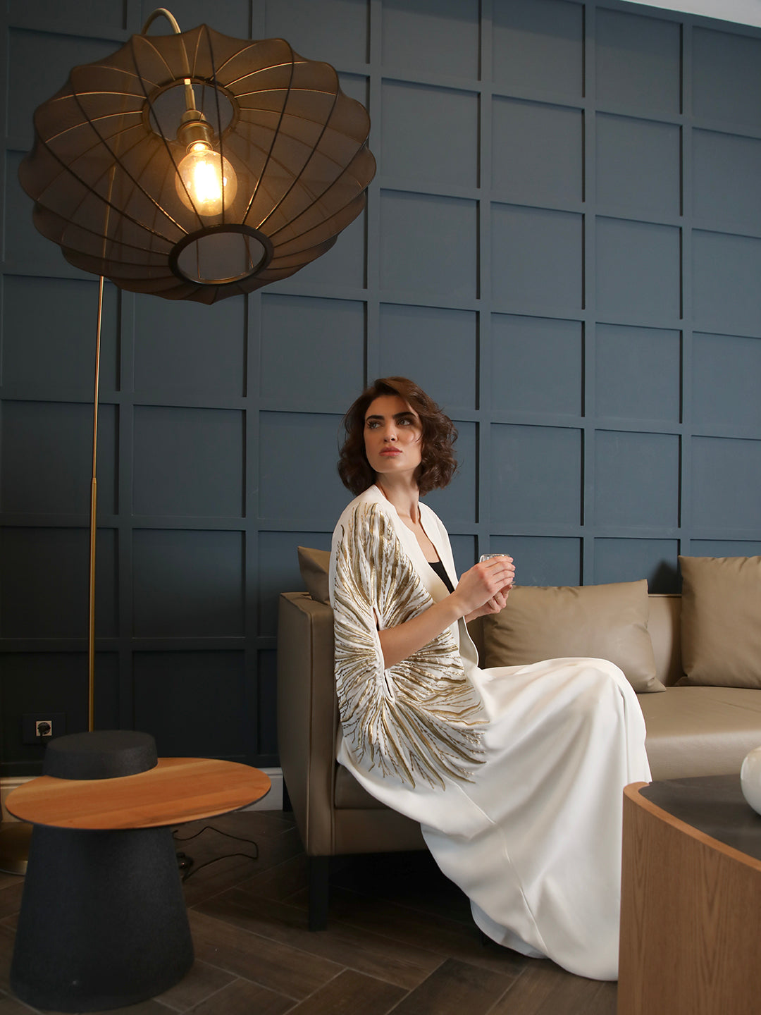 White abaya with subtle gold linear embroidery by Mouftah El Chark, elegant modest wear for women at Idole Lebanon