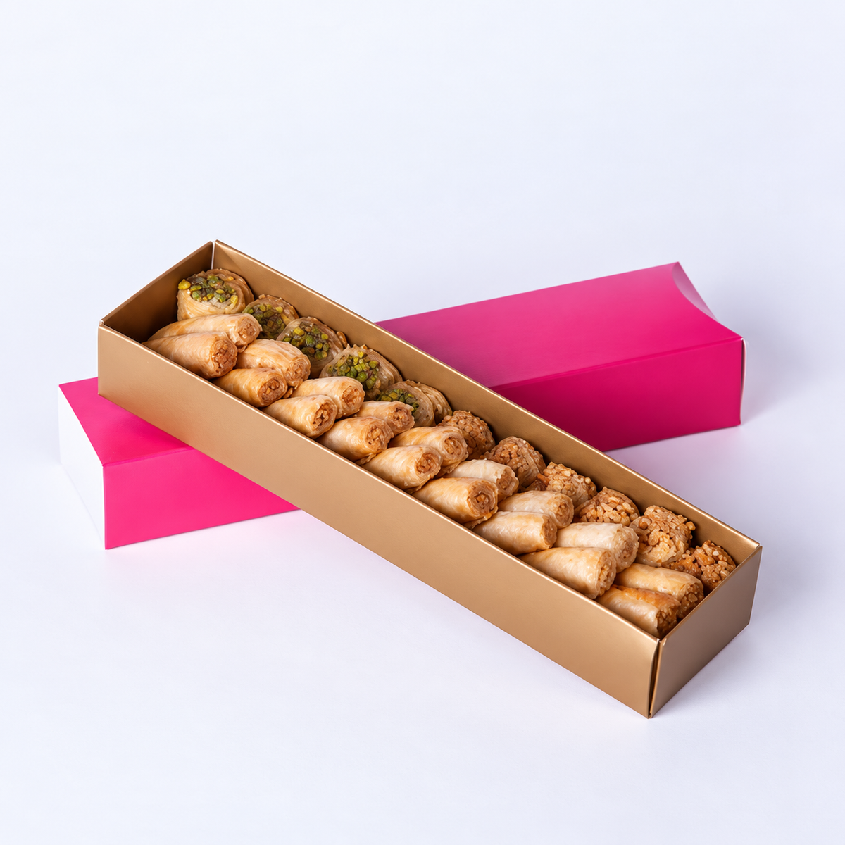 Douaihy Sweets Bar ~ 25pcs. Assorted pastries in a gold tray with pink sleeve.