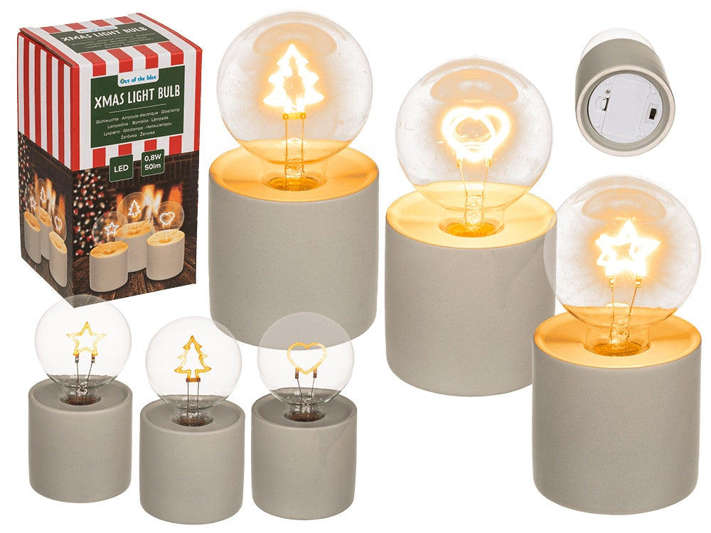 Decorative light bulb with Christmas motif inside, cement base