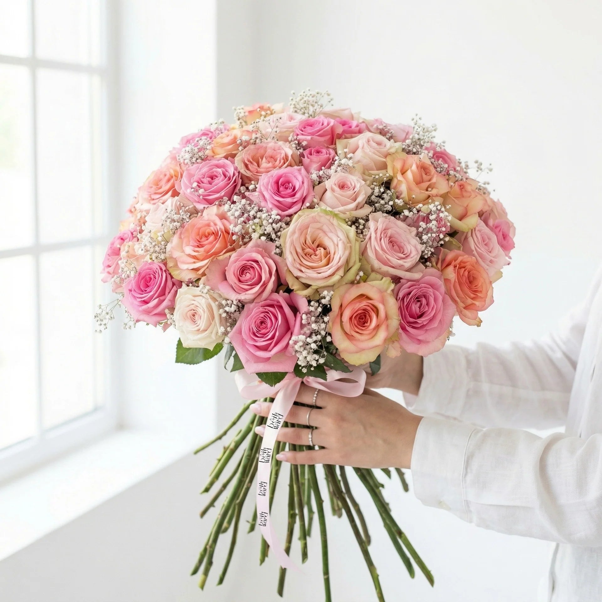 Happy Colors luxury bouquet of 50 mixed pink peach and cream roses for flower delivery in Lebanon by Idole Lebanon