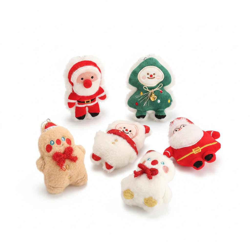 Pair of plush Christmas pendants wearing knitted scarves