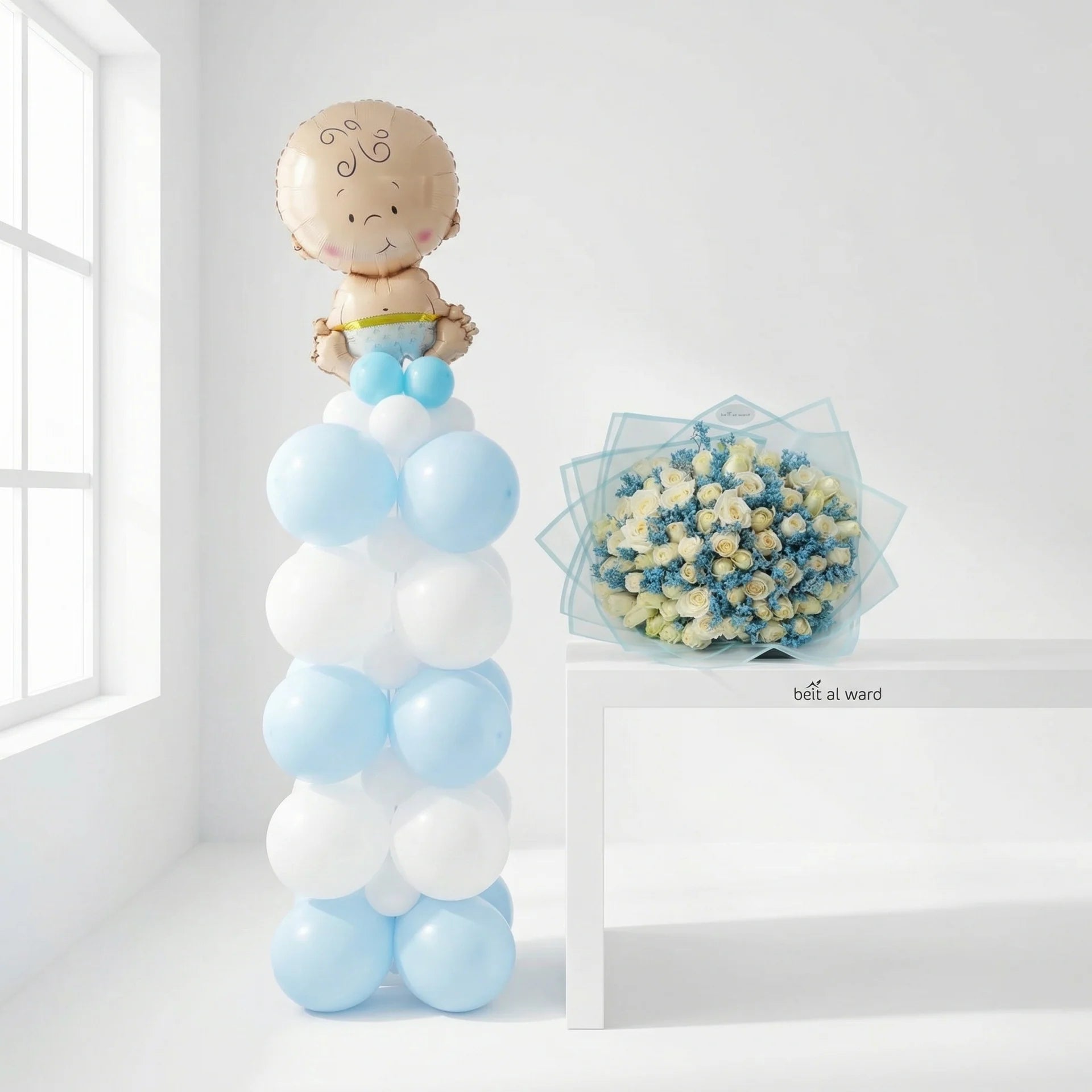 Hello Baby Boy celebration set with blue balloon stand and flower bouquet for newborn delivery in Lebanon by Idole Lebanon