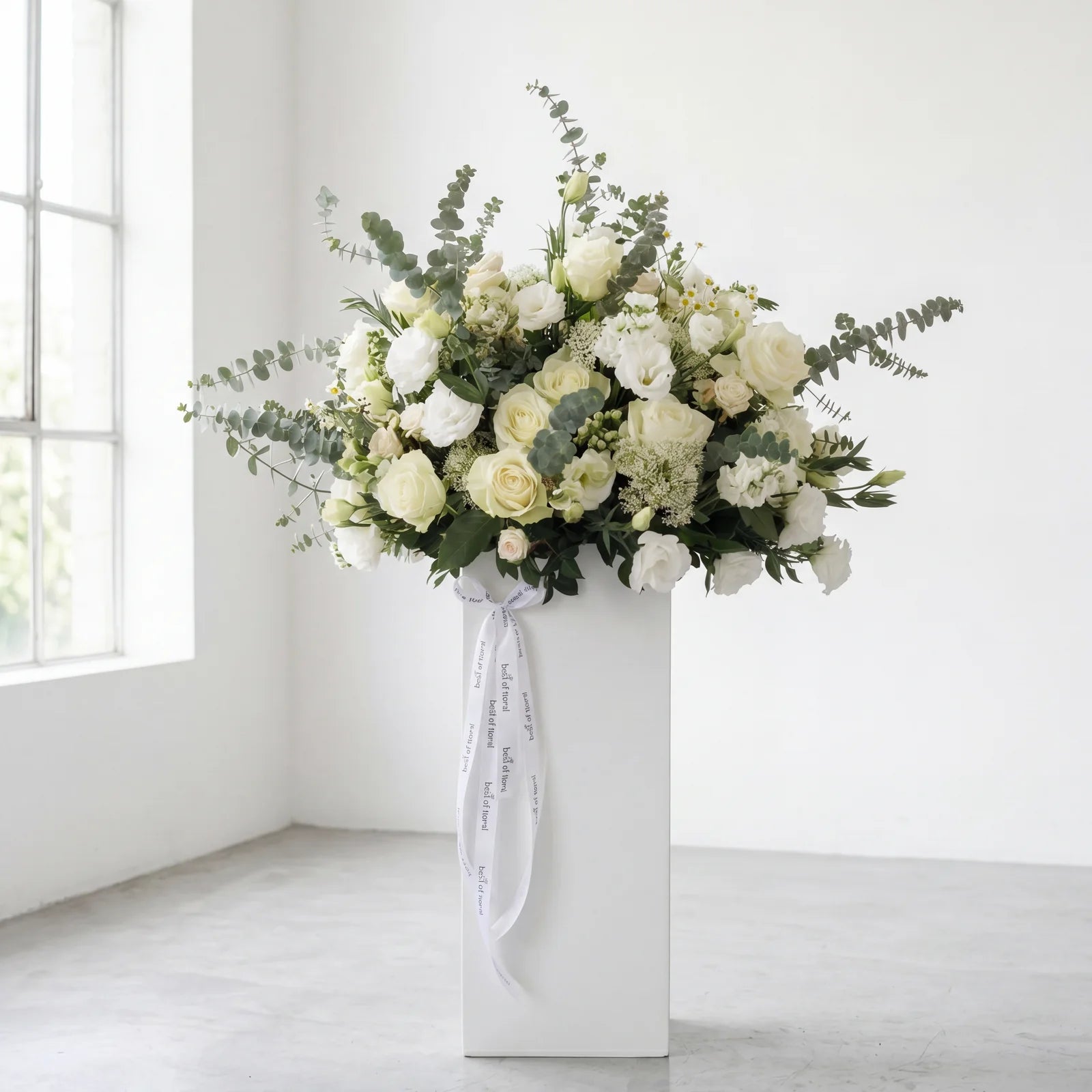Elegant white flower arrangement in box with roses and greenery for weddings and occasions in Lebanon