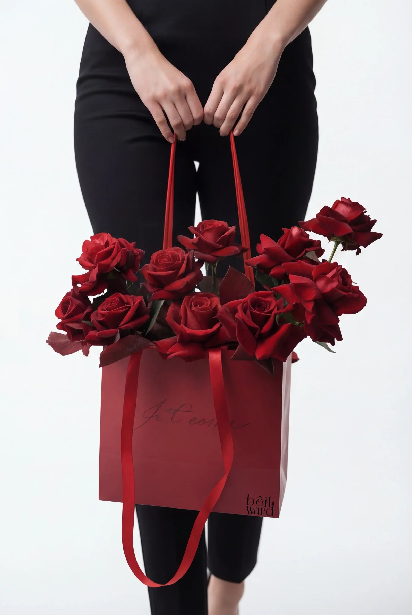 Red roses arrangement in Je taime bag with ribbons for romantic gifting in Lebanon by Beit El Ward