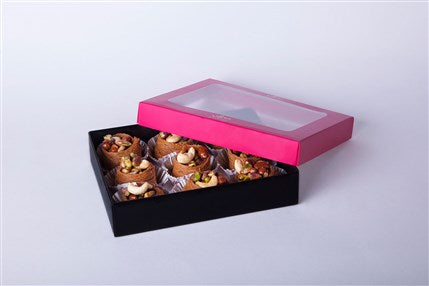 Taj El Malak Lebanese pistachio and hazelnut pastries by Douaihy Sweets