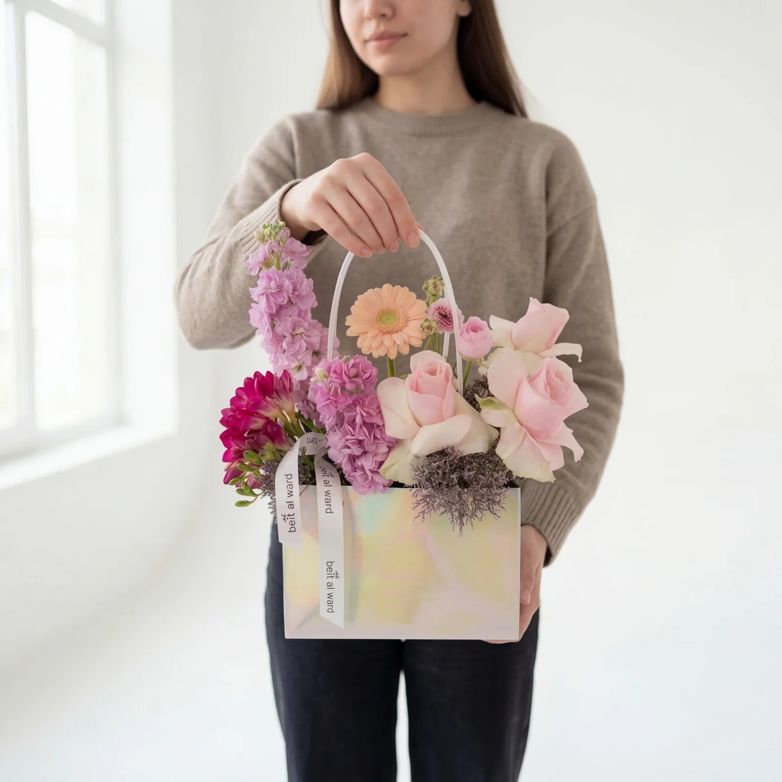 Medium pastel flower arrangement in bag with mixed fresh flowers Beirut Lebanon