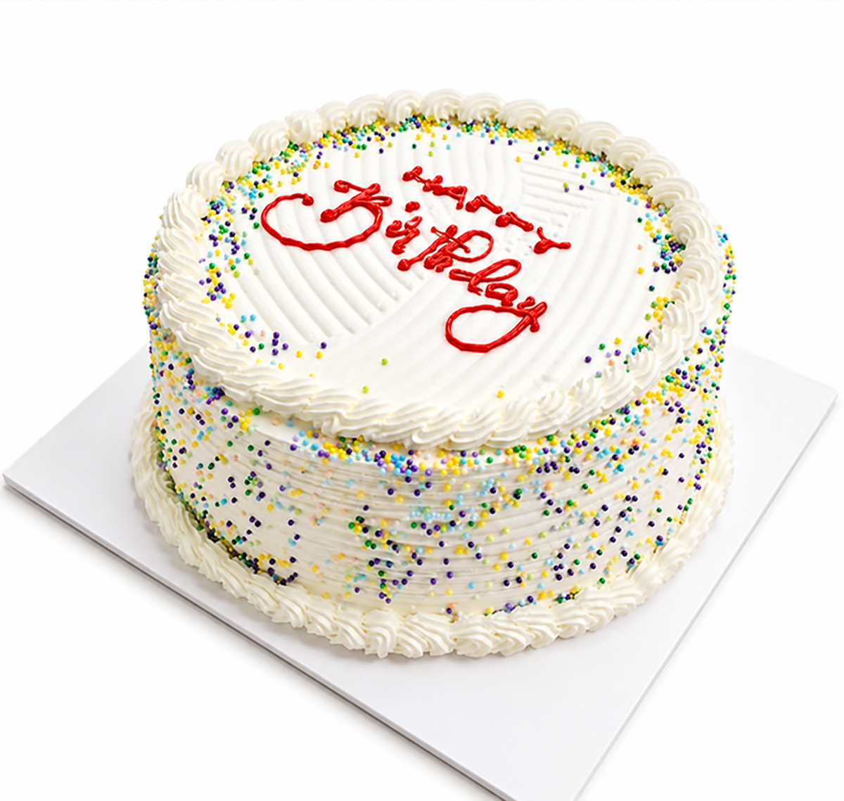 كيك عيد ميلاد أبيض برشات ملونة وكتابة Happy Birthday حمراء