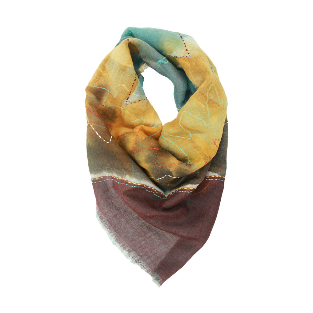 Elegant scarves by Mouftah El Chark available at Idole Lebanon for Lebanese-inspired gifting.
