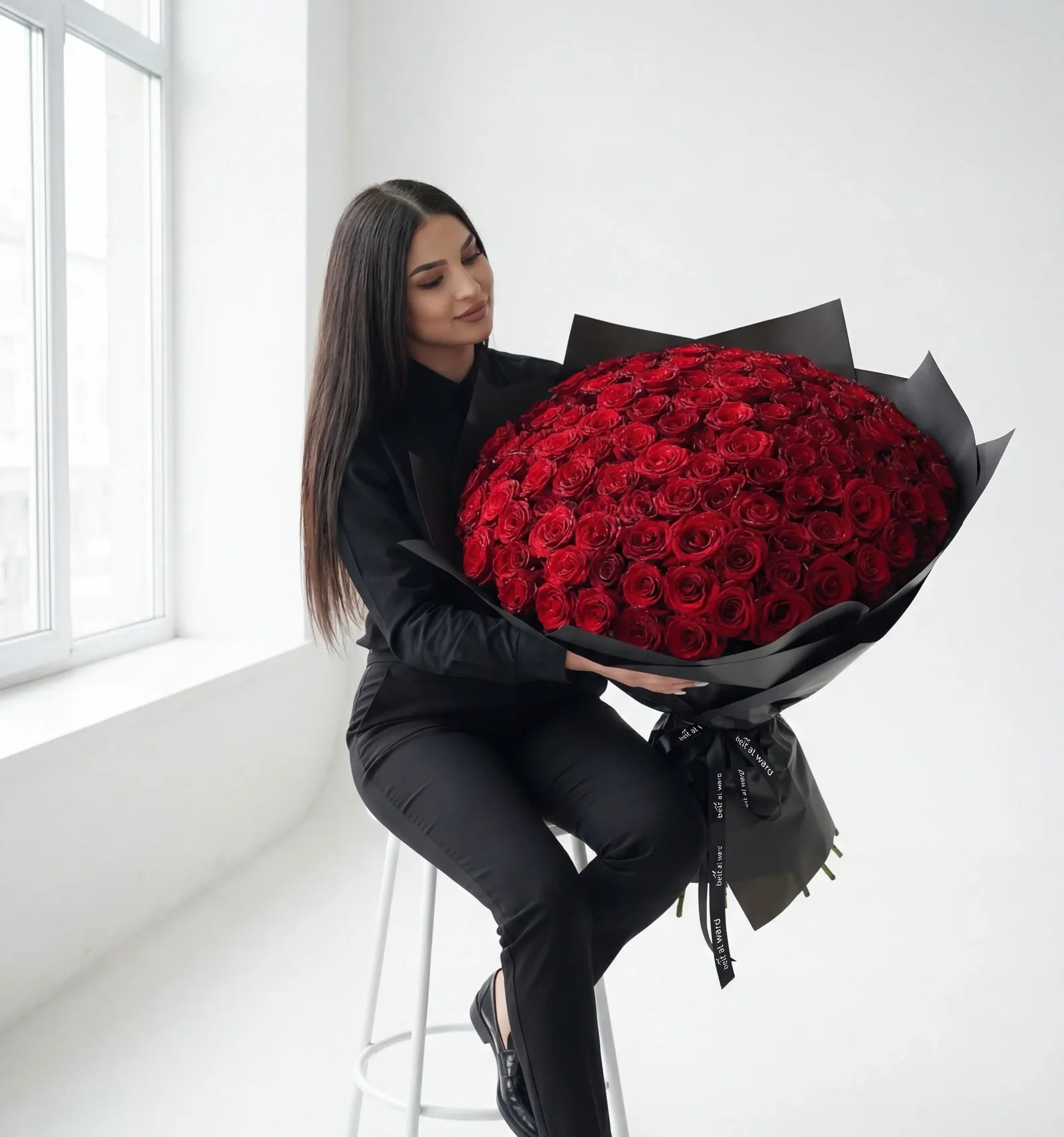 150 red roses luxury bouquet in black wrapping Lebanon by Beit El Ward
