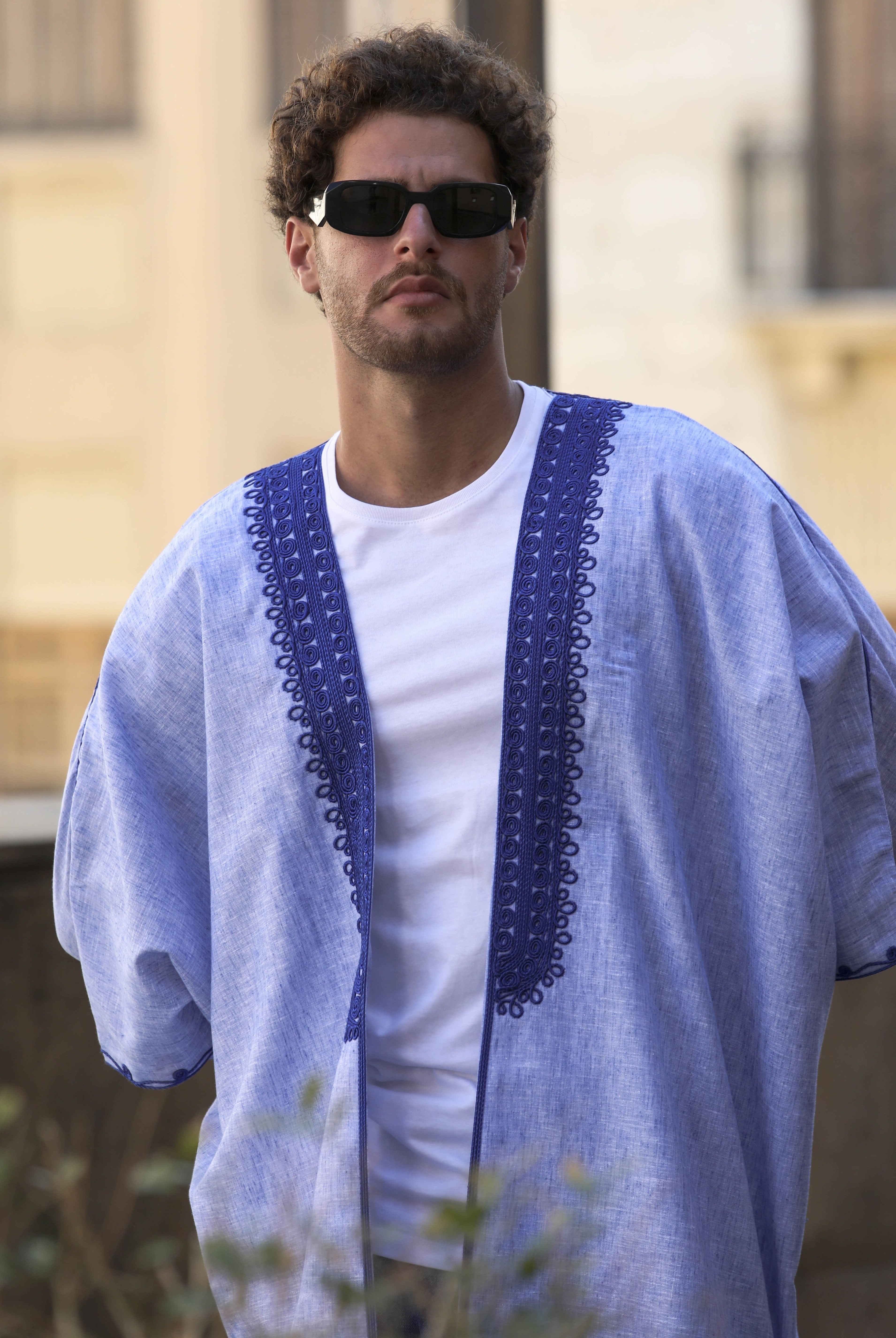 Blue linen men abaya with embroidered detail by Mouftah El Chark, lightweight summer modest wear at Idole Lebanon
