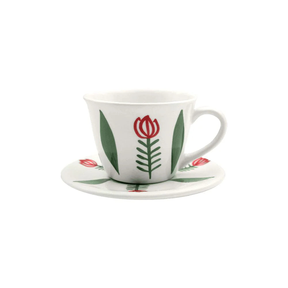 Handmade green ceramic tea cup with matching plate inspired by Lebanese artisan design