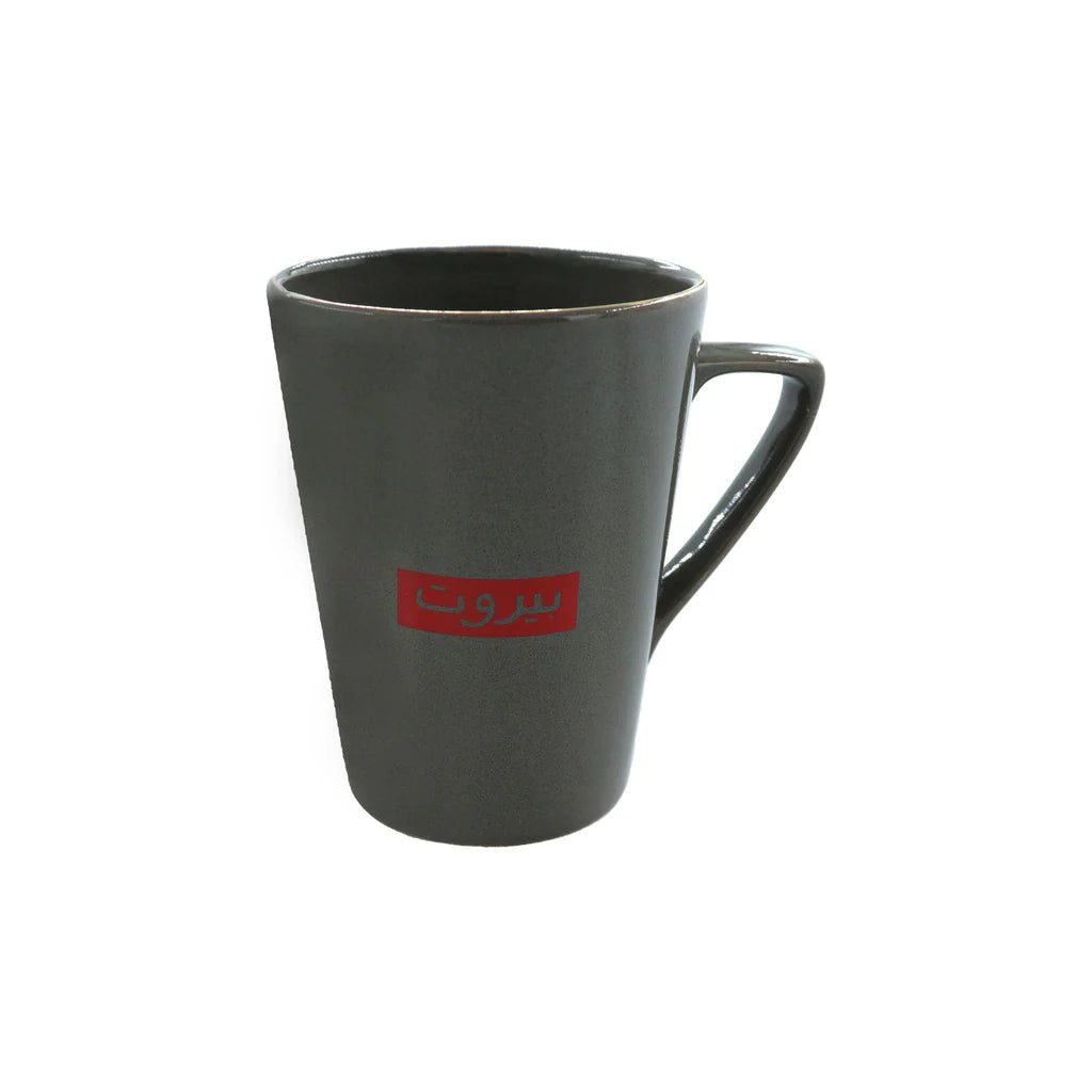 Grey porcelain mug with red Beirut typography and minimalist modern design