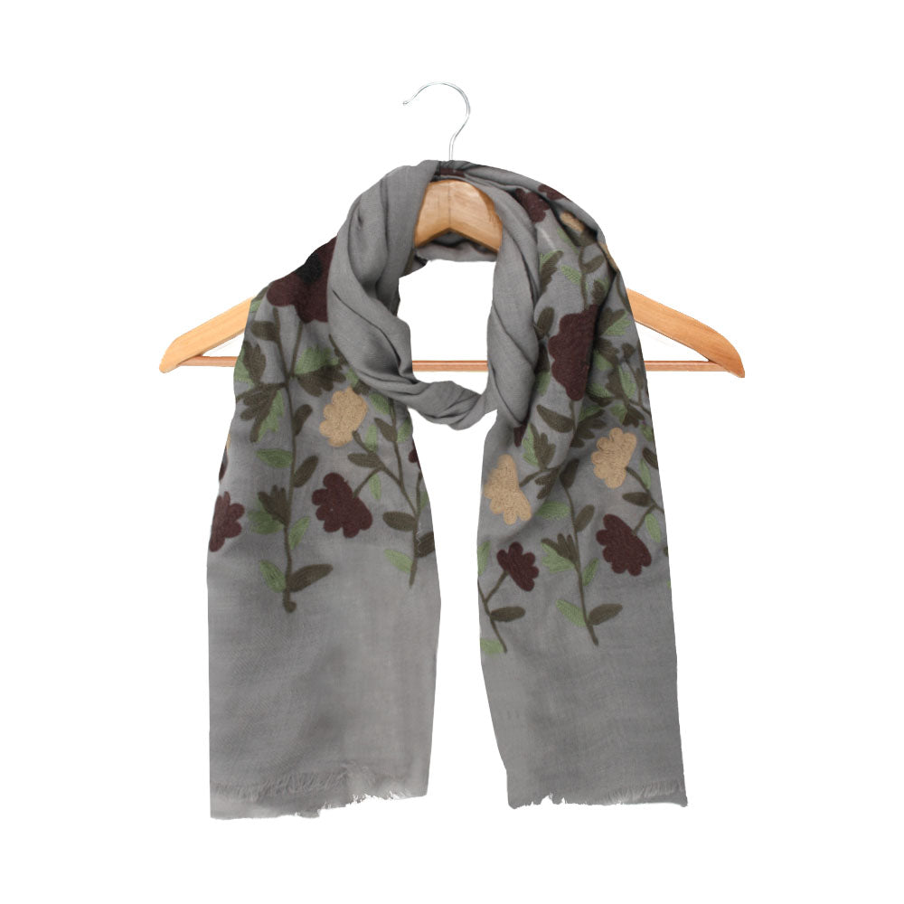 Grey wool scarf with floral pattern by Mouftah El Chark, elegant winter accessory at Idole Lebanon