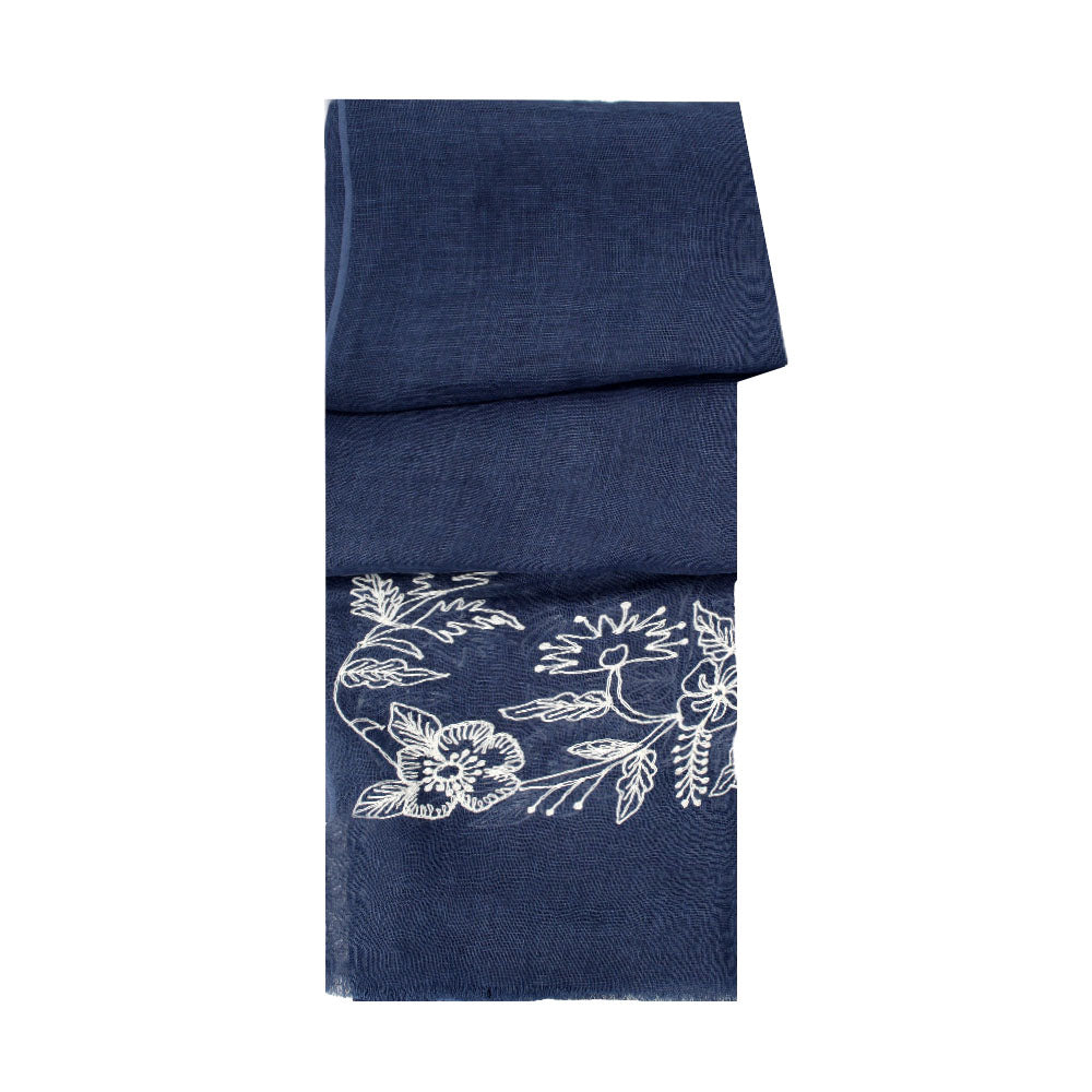 Denim blue linen scarf with white floral pattern by Mouftah El Chark, elegant lightweight summer accessory at Idole Lebanon