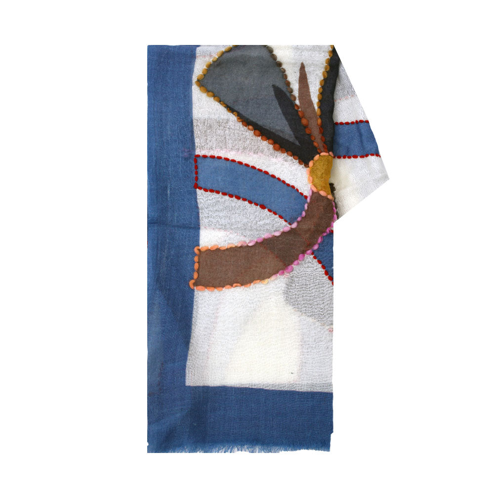 White and blue wool scarf with artistic pattern by Mouftah El Chark, elegant statement winter accessory at Idole Lebanon