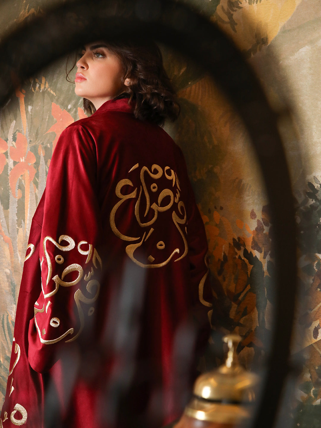 Burgundy velvet abaya with mandala embroidery by Mouftah El Chark, elegant statement modest wear for women at Idole Lebanon