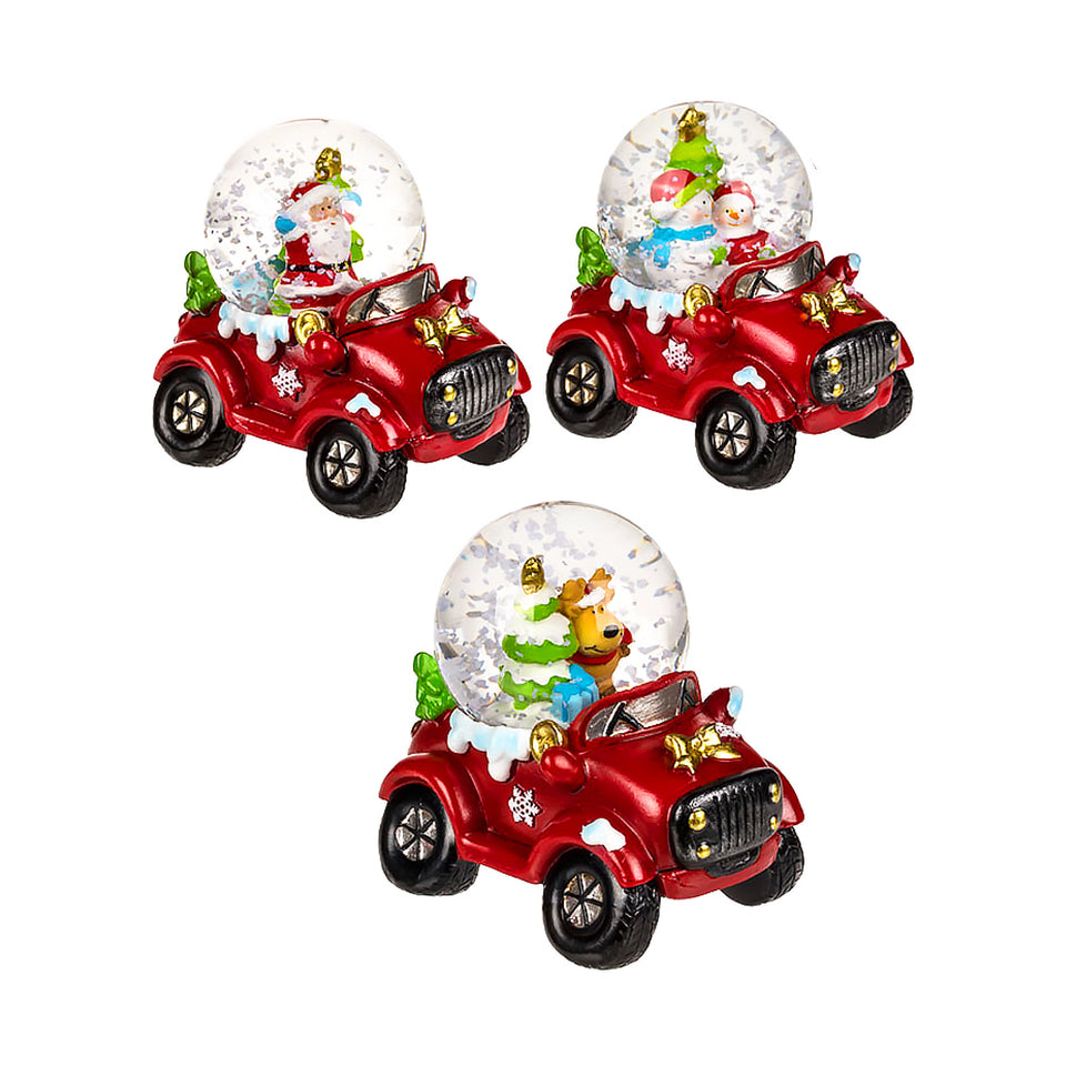 Christmas snow globe on a car-shaped base