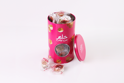 Circular tin filled with Lebanese baklava assortment by Douaihy Sweets