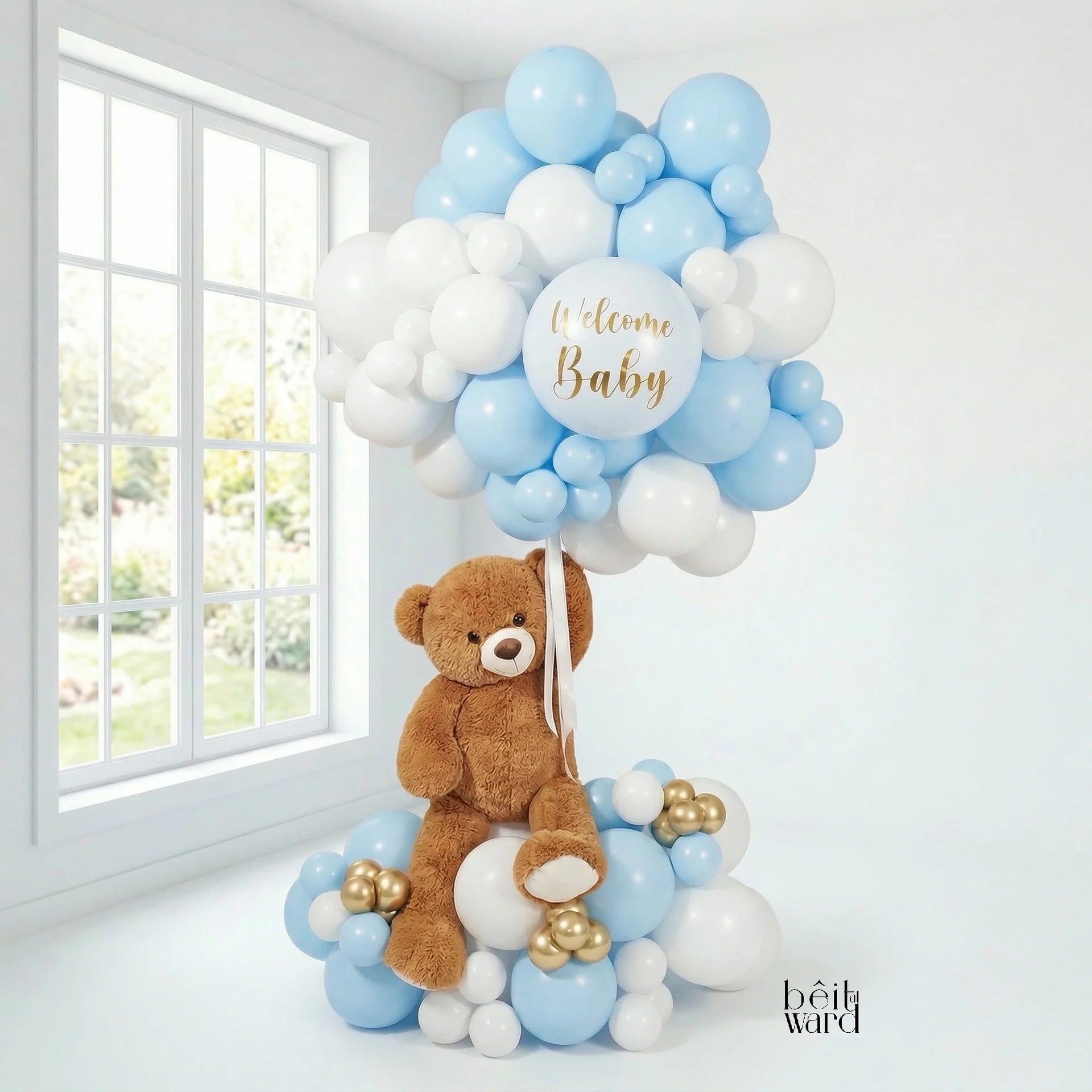 Teddy’s Here luxury blue and white welcome baby balloon stand with teddy bear for delivery in Lebanon by Idole Lebanon
