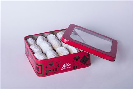 Lebanese pistachio maamoul cookies in elegant tin box by Douaihy Sweets