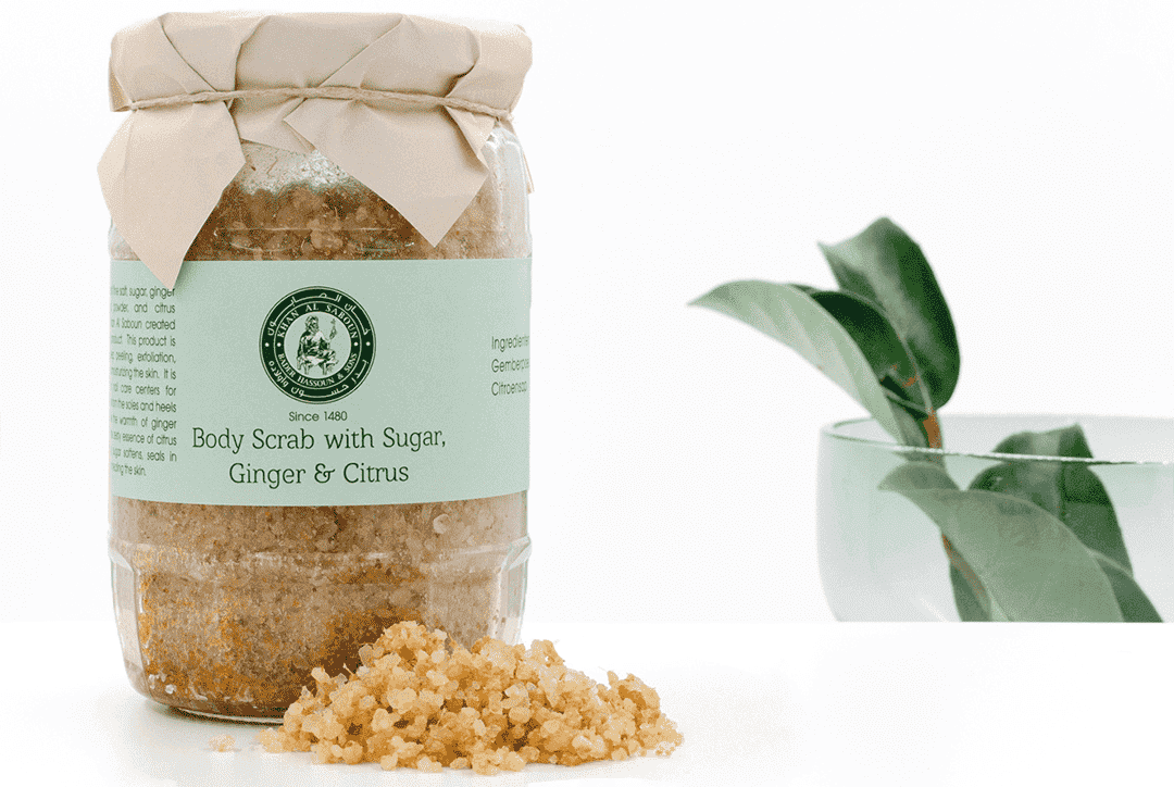 Ginger and lemon sea salt scrub jar by Khan Al Saboun with natural skincare presentation in USA
