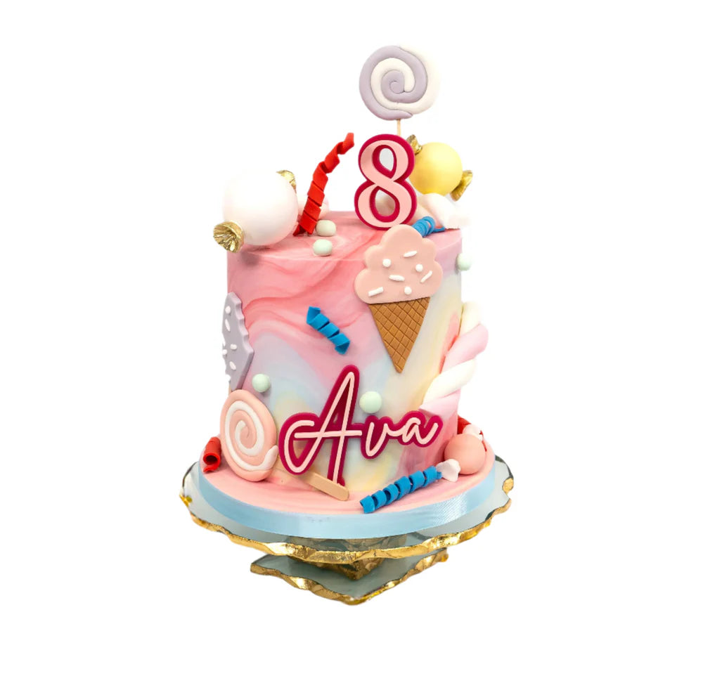candyland birthday cake with pastel colors candy decorations custom name topper and number topper in Lebanon