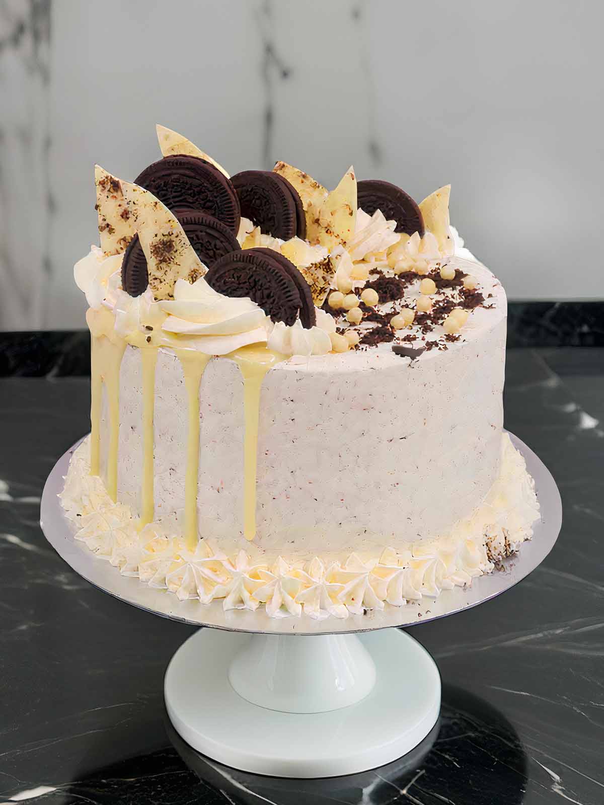 cookies and cream oreo cake with chocolate drip birthday cake Lebanon