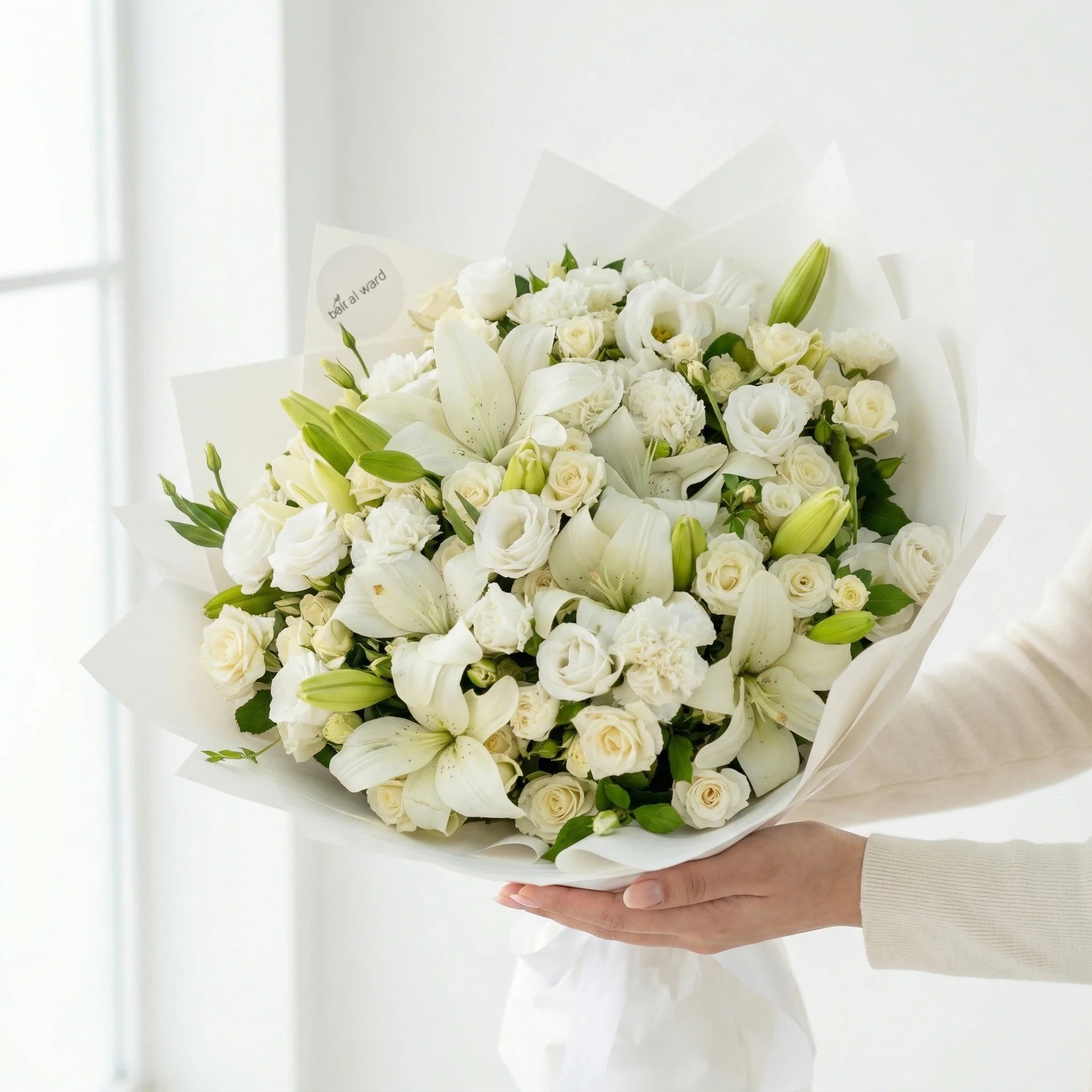 Pure Lilies luxury bouquet of white lilies and roses for flower delivery in Lebanon by Idole Lebanon