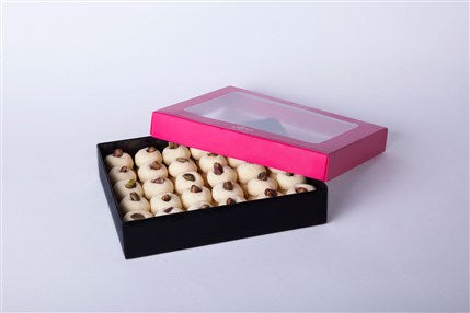 Traditional Lebanese Ghoraybeh shortbread cookies with pistachios by Douaihy Sweets