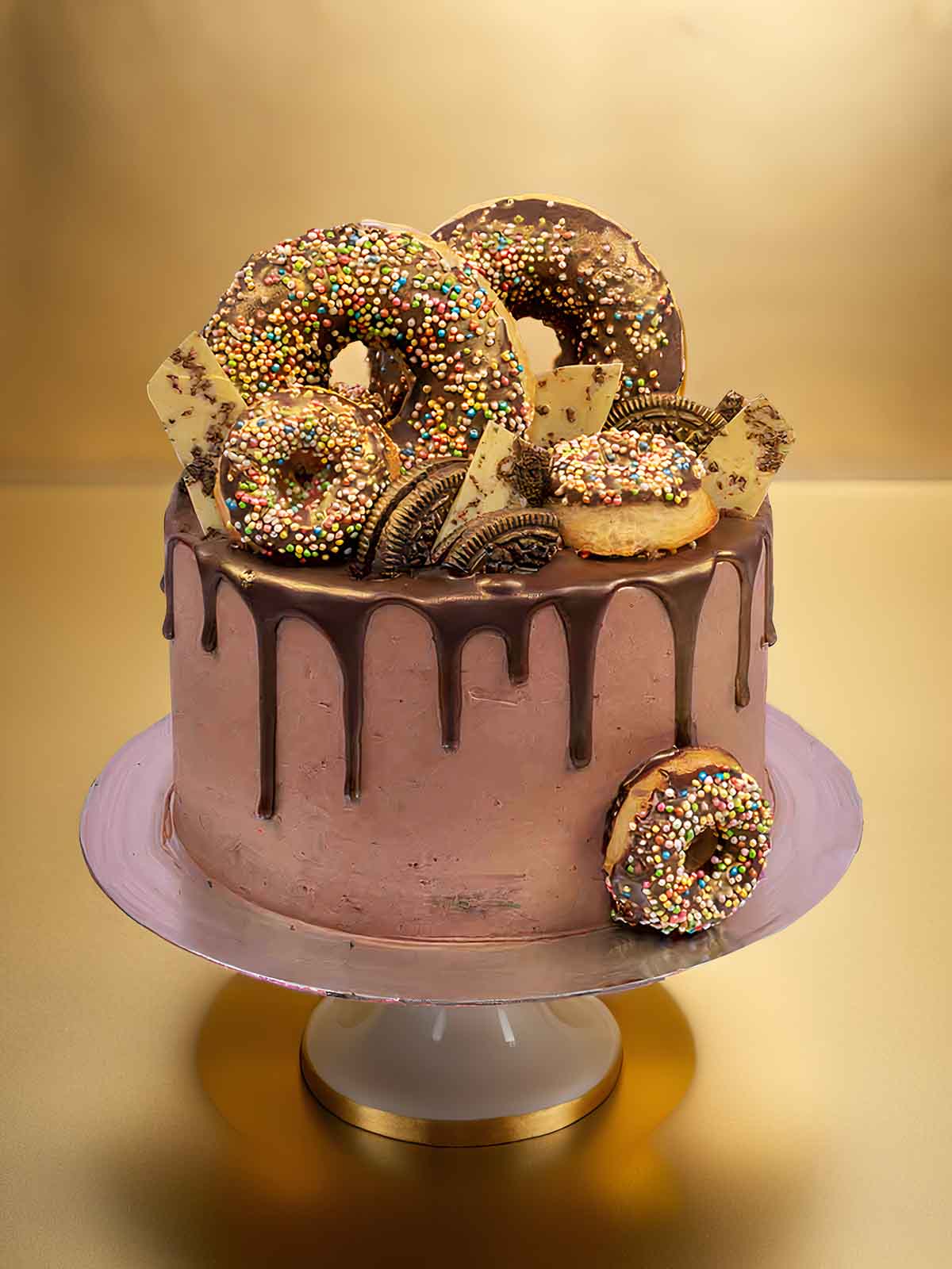 chocolate doughnut drip cake with oreo toppings birthday cake Lebanon