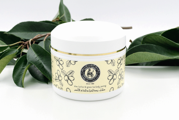 Shea butter and green tea body scrub jar by Khan Al Saboun for exfoliating skincare in USA
