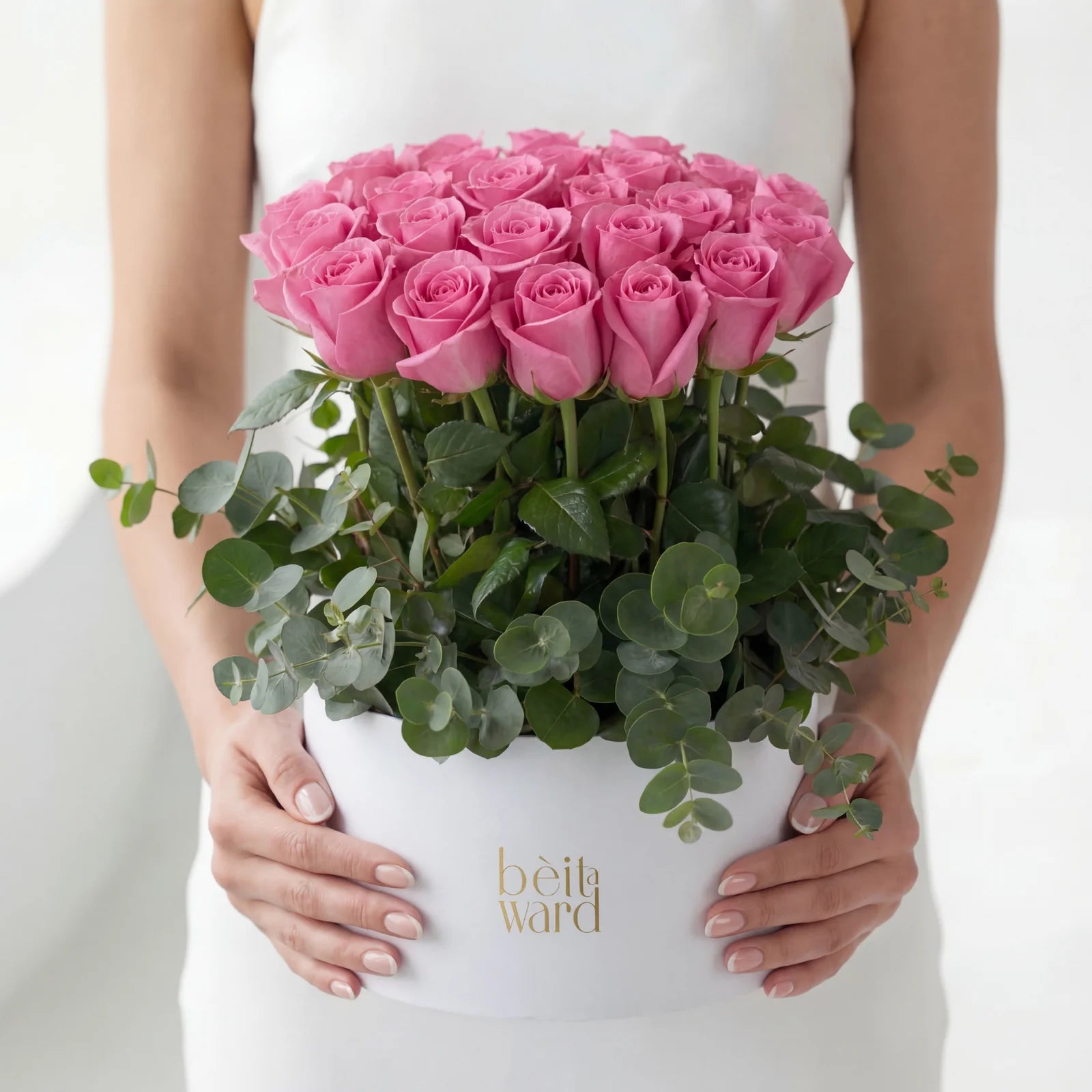 24 pink roses with eucalyptus in white box flower arrangement Beirut Lebanon